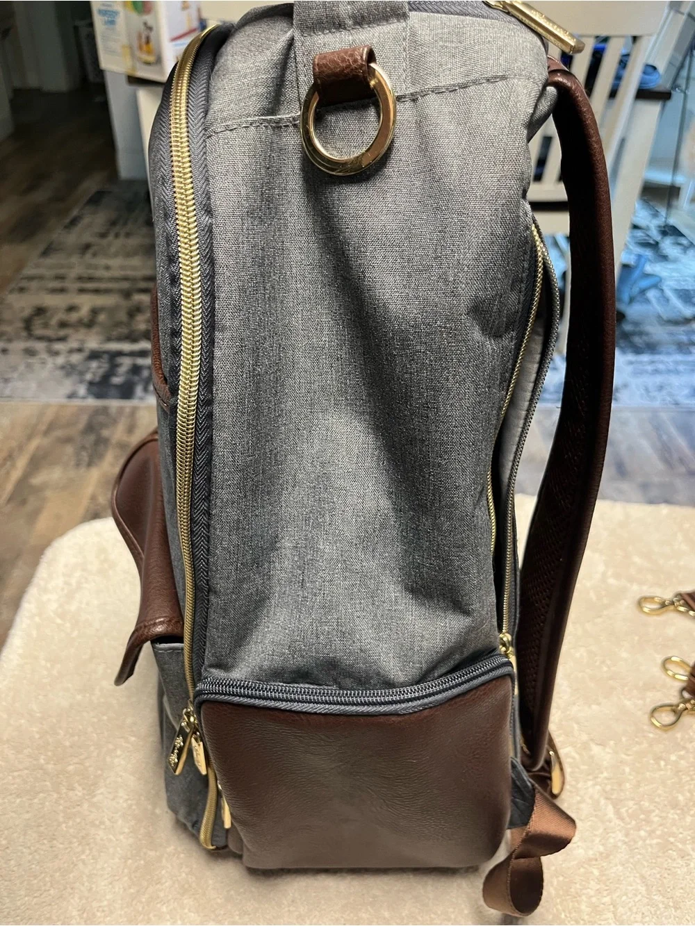 Itzy Ritzy Gray and Brown Baby Backpack with Gold Hardware